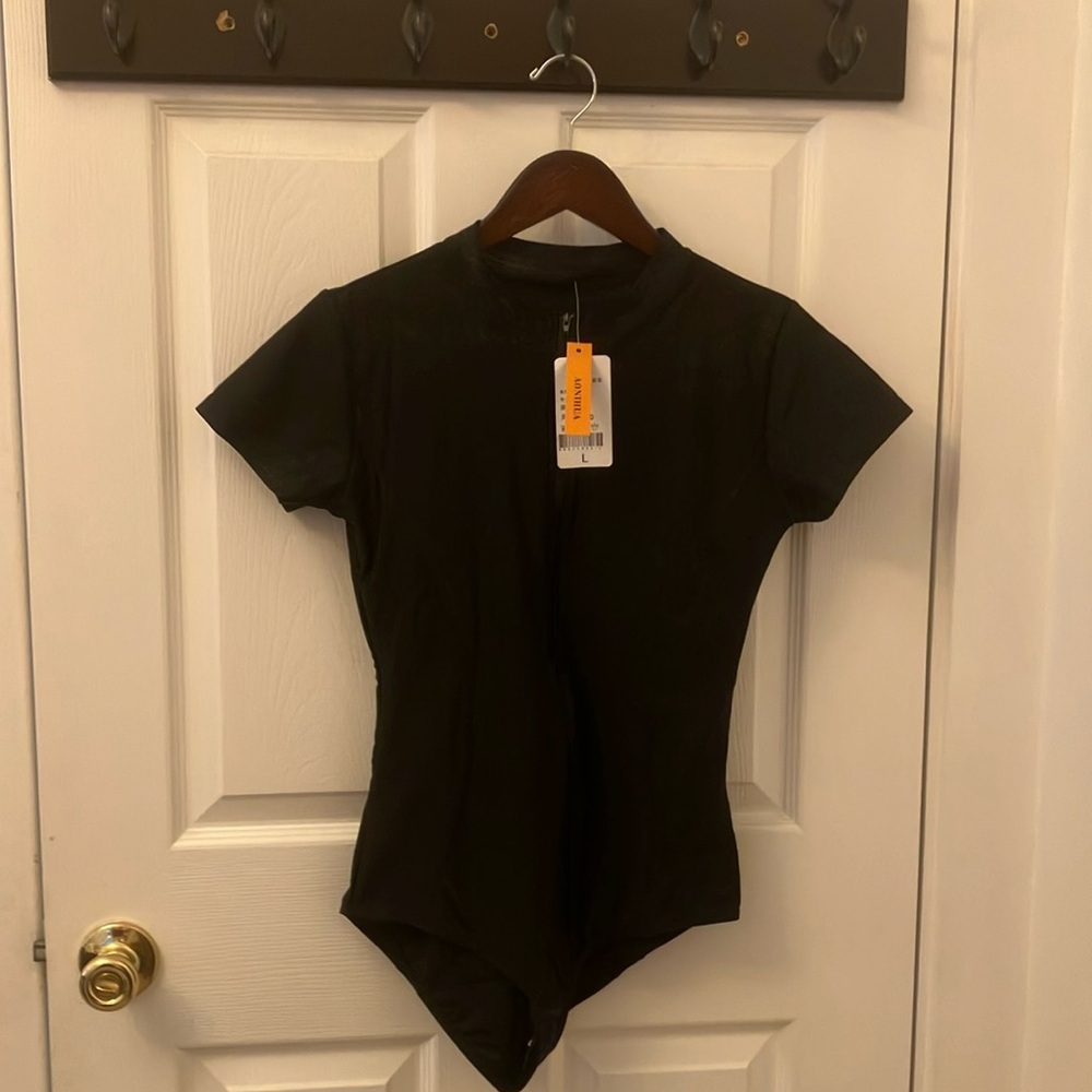 rashguard swimsuit… never worn except to try on… to small so re poshing.